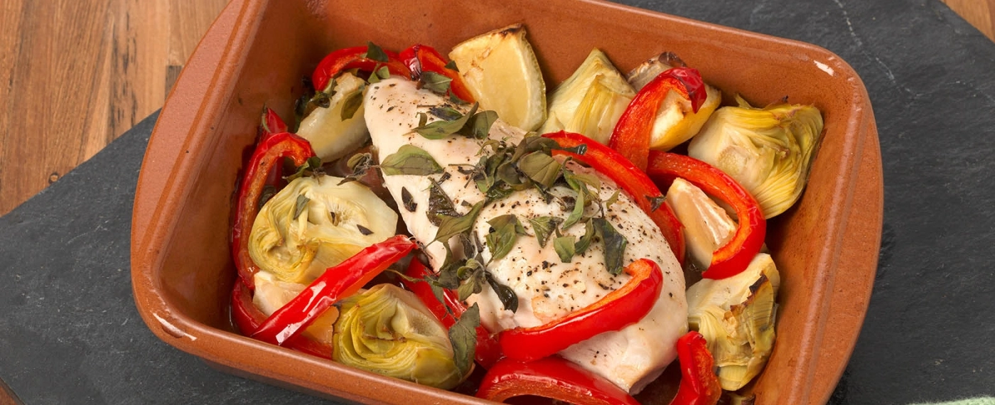 Kipfilet met citroen en artisjokharten uit de oven