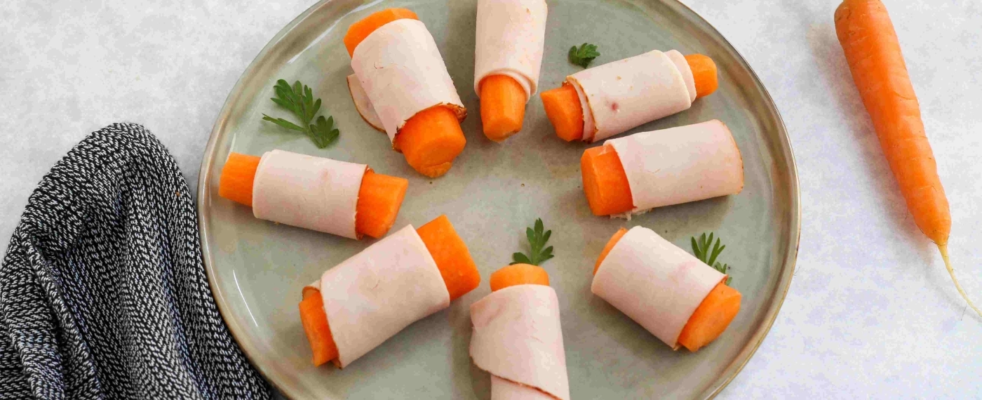 Worteltjes met plakjes kalkoenfilet