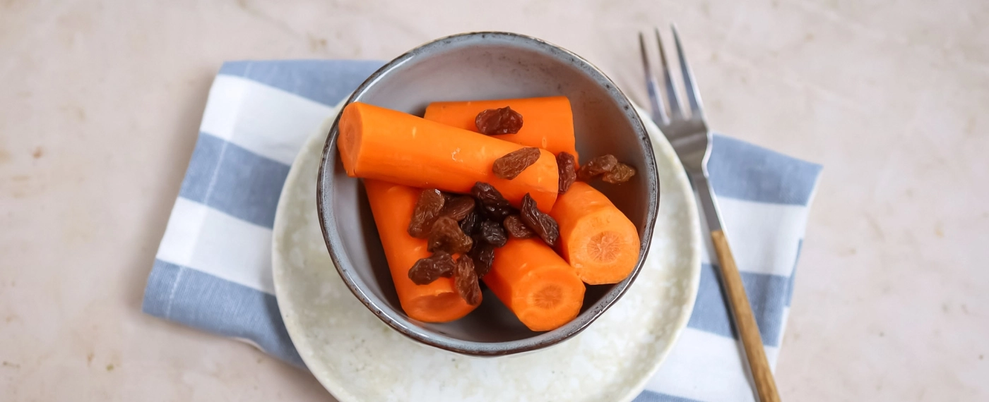 Worteltjes met handje rozijnen