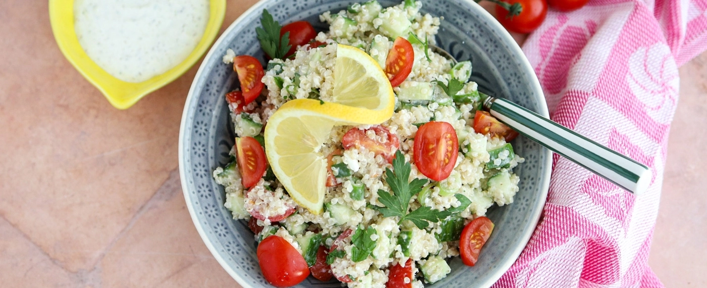 Quinoa met tomaatjes & feta dressing