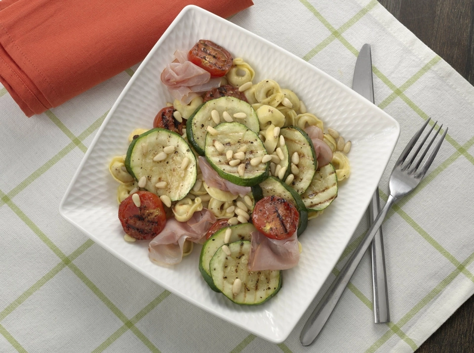 Tortellini met tomaat & rauwe ham