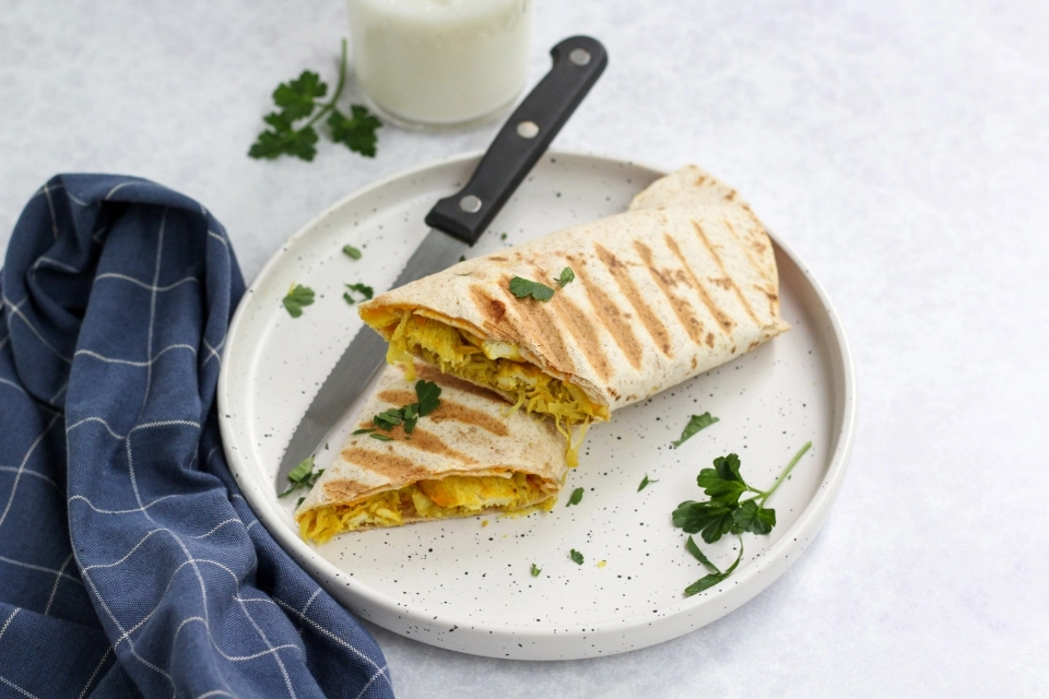 Wrap met zoete aardappel, zuurkool & kip kerrie