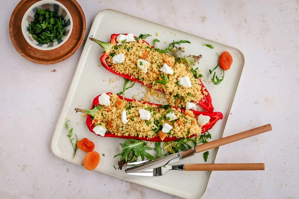 Puntpaprika gevuld met zoete couscous