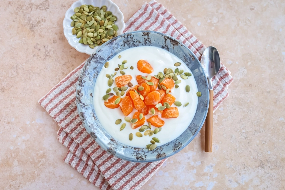 Yoghurt met mandarijn & pompoenpitten